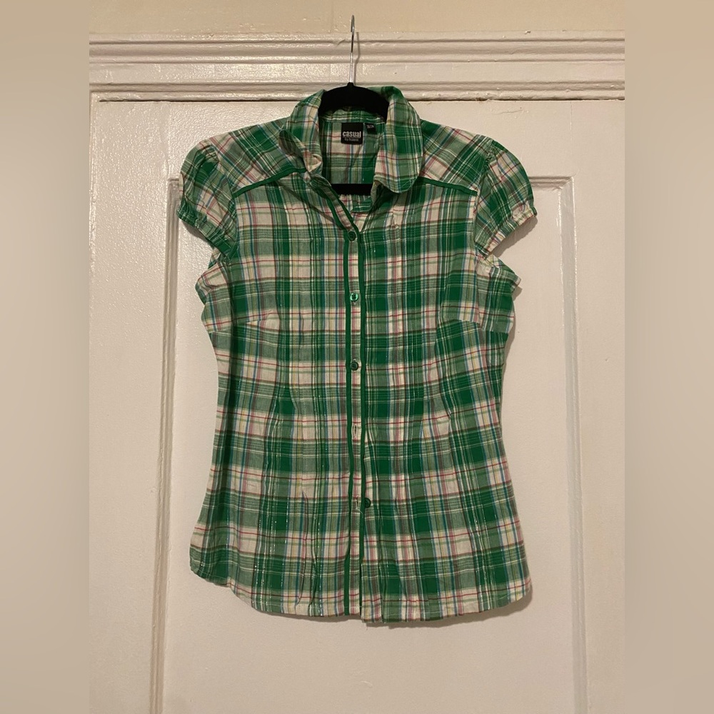 Sleeveless shirt in size 36/38. 100% cotton